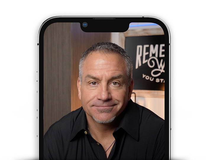 A phone showing Jeff Lagoni on social media